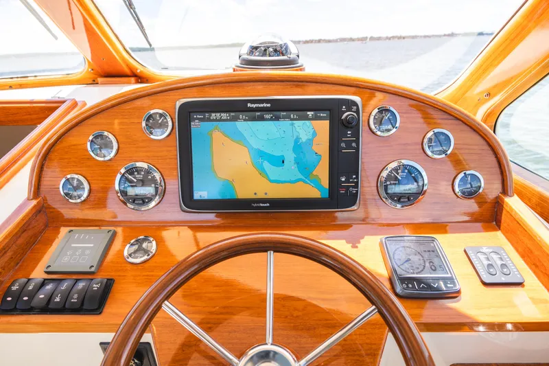 Slide: The Image of Hinckley Talaria 34 dashboard with navigation system and gauges, 2013 model. - 23