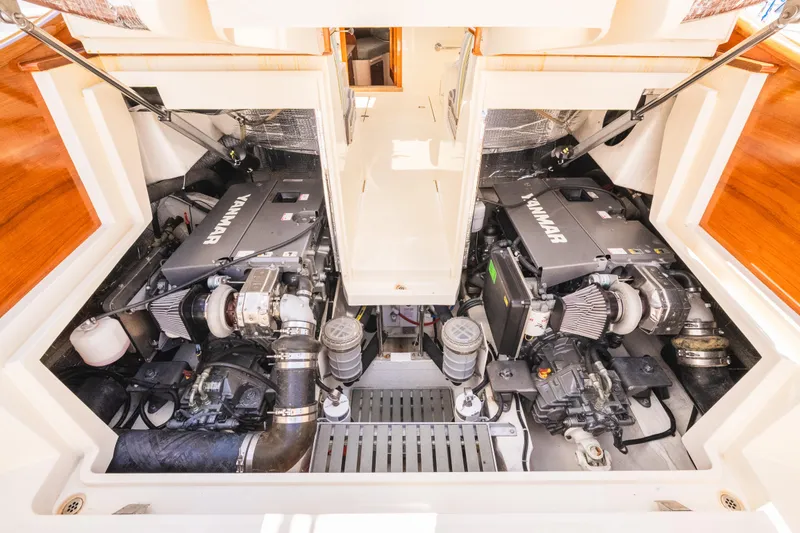 Slide: The Image of Engine compartment of 2013 Hinckley Talaria 34 with dual Yanmar engines. - 42