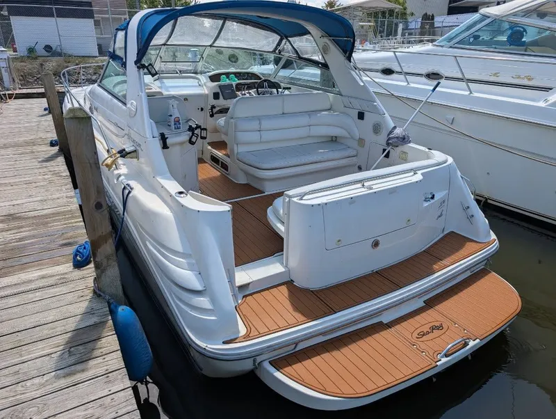 Slide: The Image of 1995 Sea Ray Sundancer 330 at dock, interior view. - 1