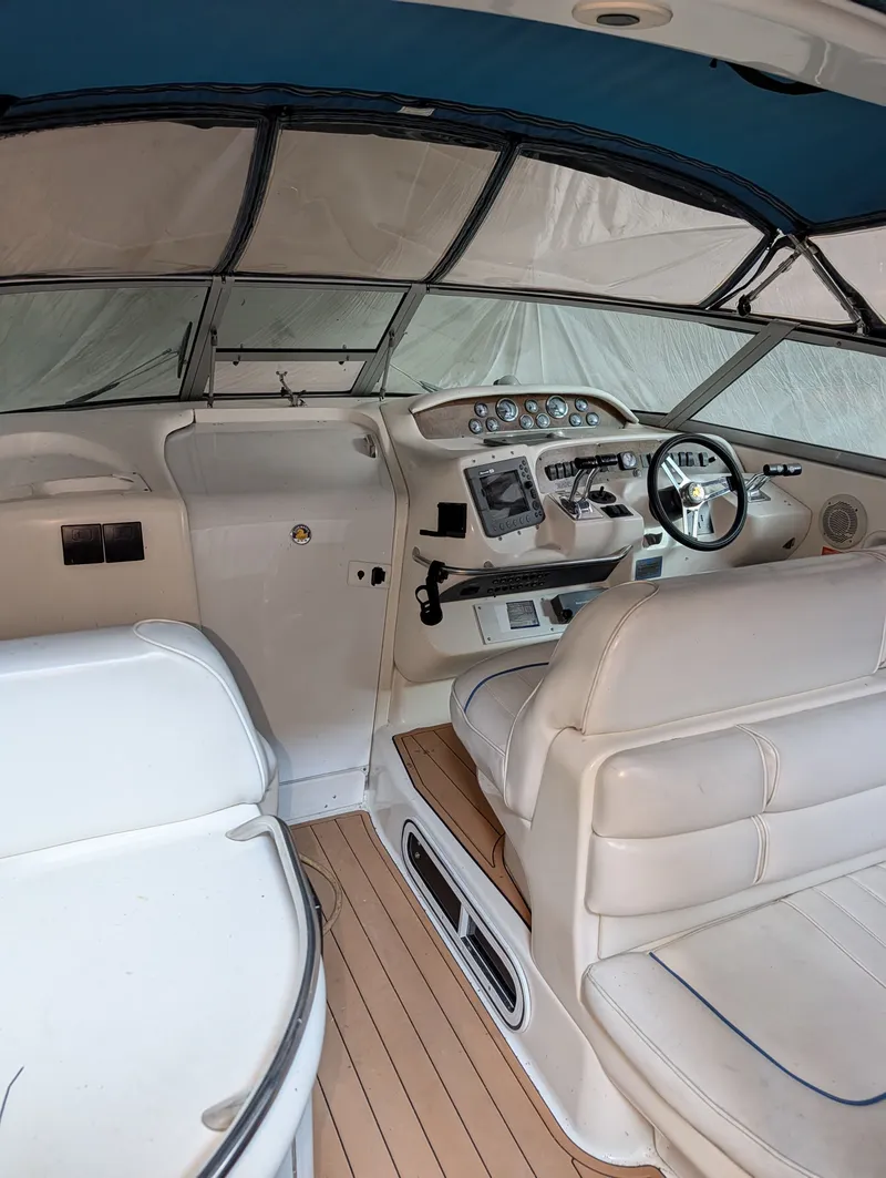 Slide: The Image of Interior of a 1995 Sea Ray Sundancer 330 yacht with helm station. - 4