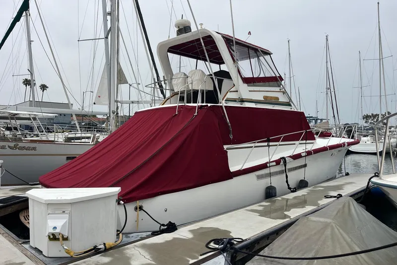 Slide: The Image of Egg Harbor 52 Convertible 1980 wooden interior with logo detail. - 2