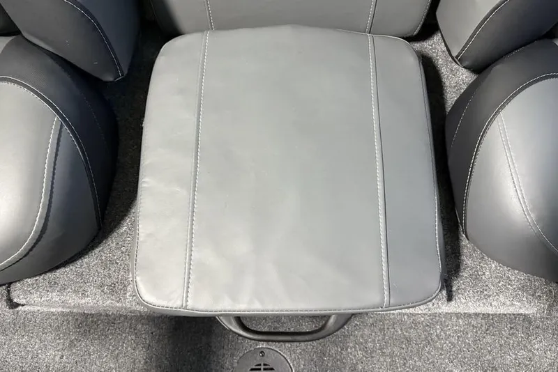 Slide: The Image of 2026 Tracker Pro Team 190 boat interior with gray cushioned seating. - 13