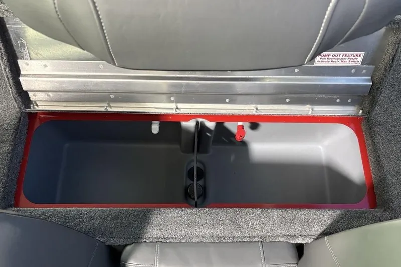 Slide: The Image of Storage compartment in 2026 Tracker Pro Team 190 boat, featuring pump-out feature. - 26