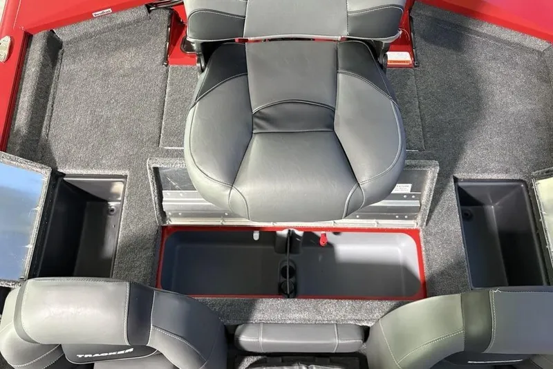 Slide: The Image of 2026 Tracker Pro Team 190 boat interior with seating and storage compartments. - 29