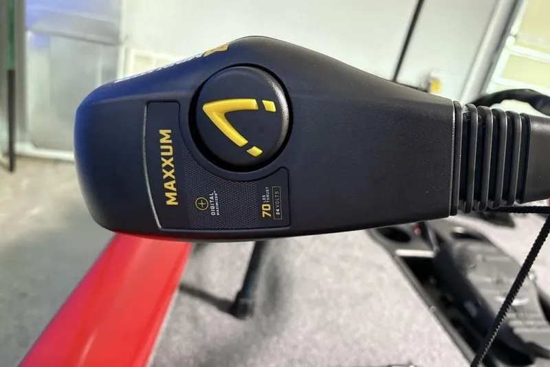 Slide: The Image of Close-up of Maxxum trolling motor control on 2026 Tracker Pro Team 190 boat. - 5