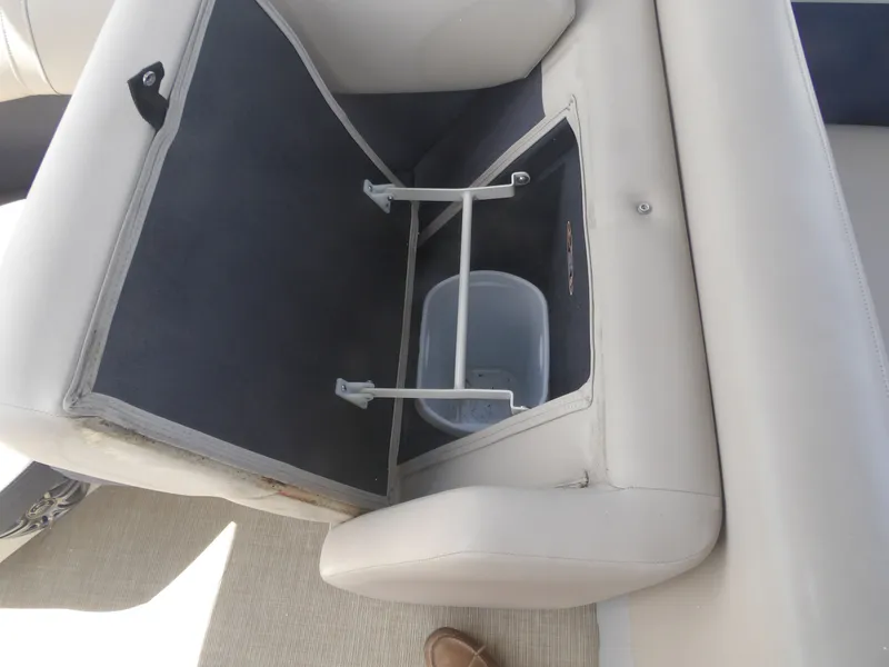 Slide: The Image of 2024 Harris Pontoon seat with integrated storage compartment. - 23