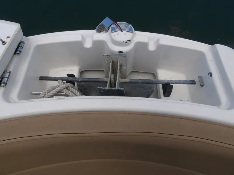 Slide: The Image of Anchor compartment of 2024 Sea Ray SPX 230. - 19