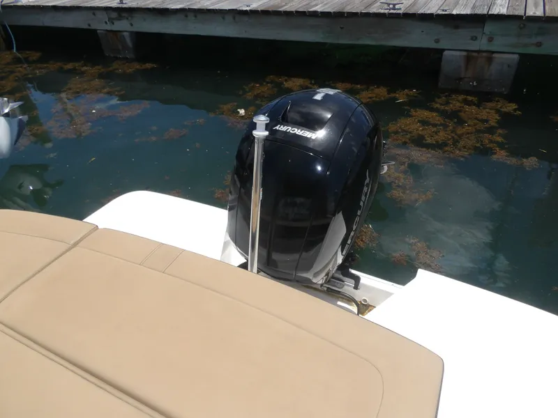Slide: The Image of 2024 Sea Ray SPX 230 with Mercury outboard motor at dock. - 24
