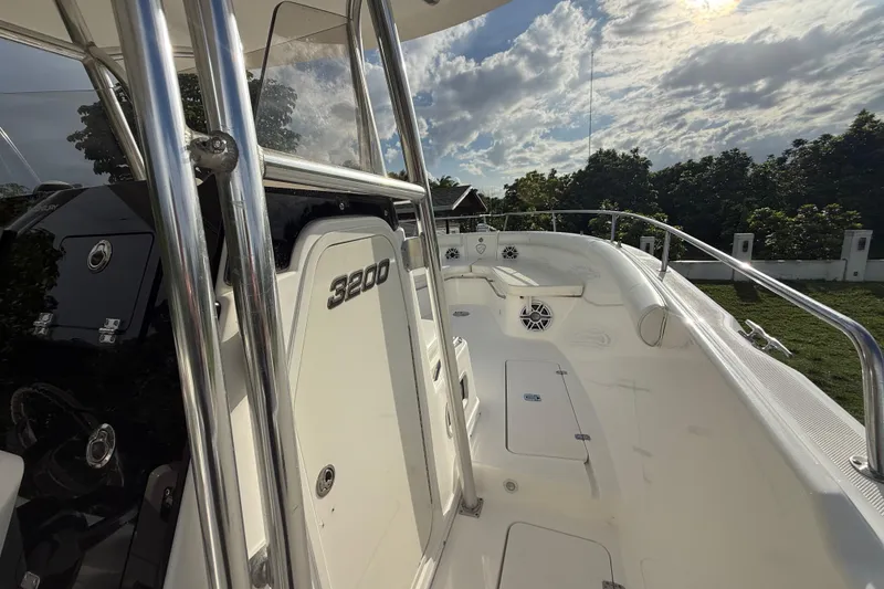 Slide: The Image of 2007 Century 3200 Center Console boat with sleek design and spacious deck. - 15