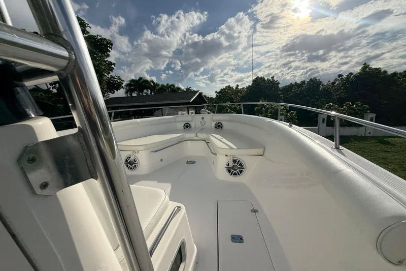 Slide: The Image of 2007 Century 3200 Center Console boat deck under a partly cloudy sky. - 17