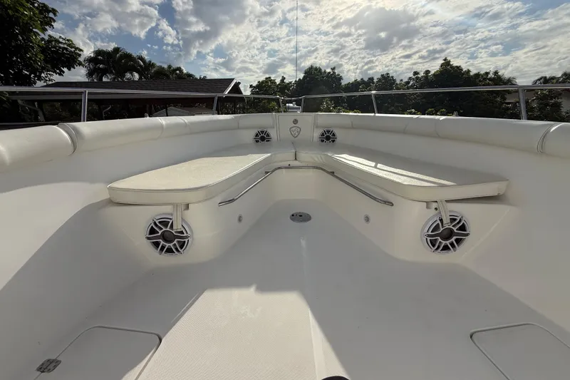 Slide: The Image of 2007 Century 3200 Center Console boat interior with cushioned seating and speakers. - 20