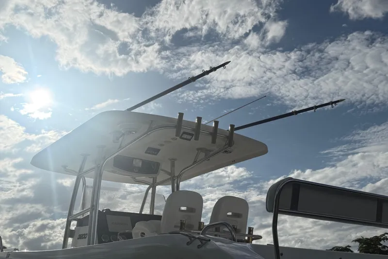 Slide: The Image of 2007 Century 3200 Center Console boat under a bright, cloudy sky. - 29