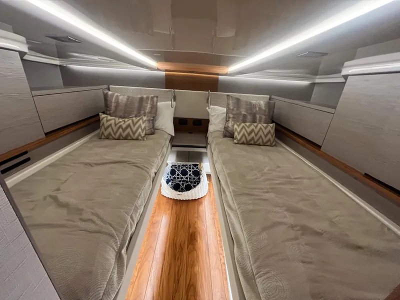 Slide: The Image of Interior of 2023 Tiara Yachts 48 LS with twin beds. - 10