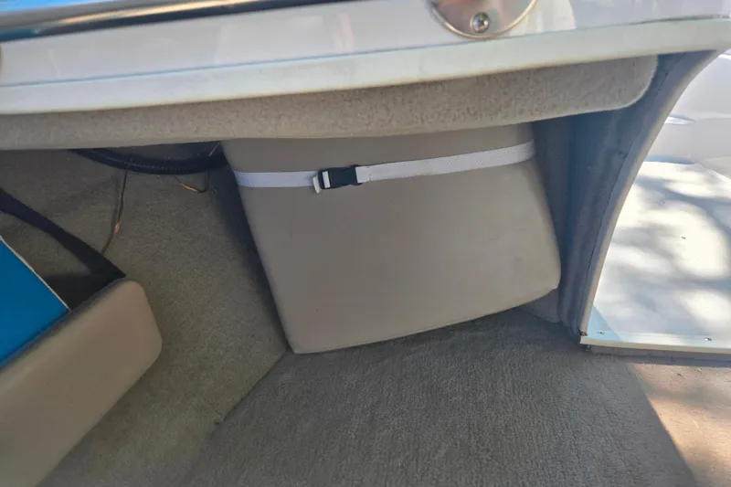 Slide: The Image of Interior of a 1996 Four Winns 200 Horizon boat showing storage compartment. - 6