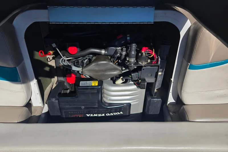 Slide: The Image of Engine compartment of a 1996 Four Winns 200 Horizon boat with Volvo Penta engine. - 9
