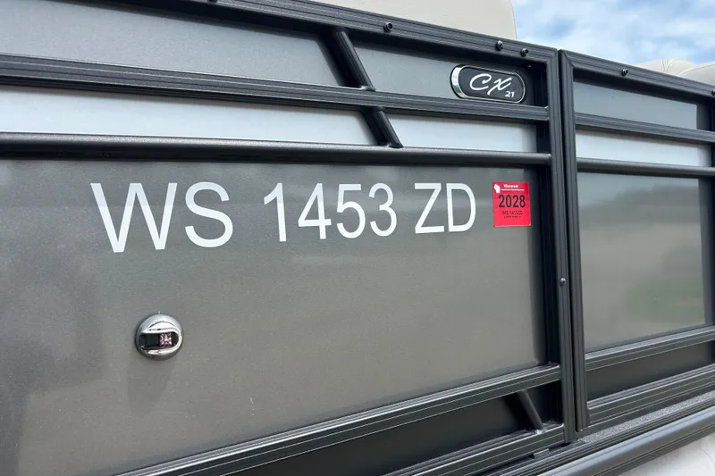 Slide: The Image of 2022 Starcraft CX 21 C boat with registration WS 1453 ZD and 2028 sticker. - 15