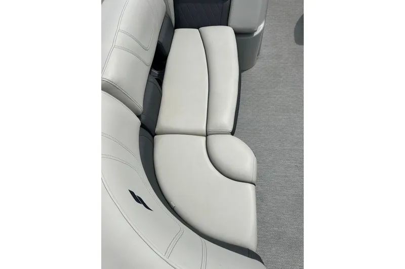 Slide: The Image of 2022 Starcraft CX 21 C boat interior with gray cushioned seating. - 19