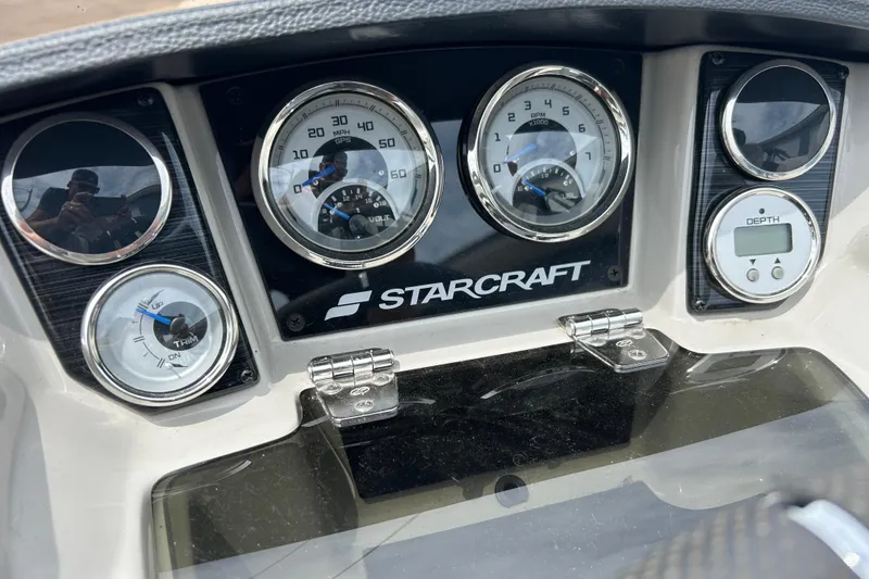 Slide: The Image of Dashboard of 2022 Starcraft CX 21 C boat with gauges and controls. - 20