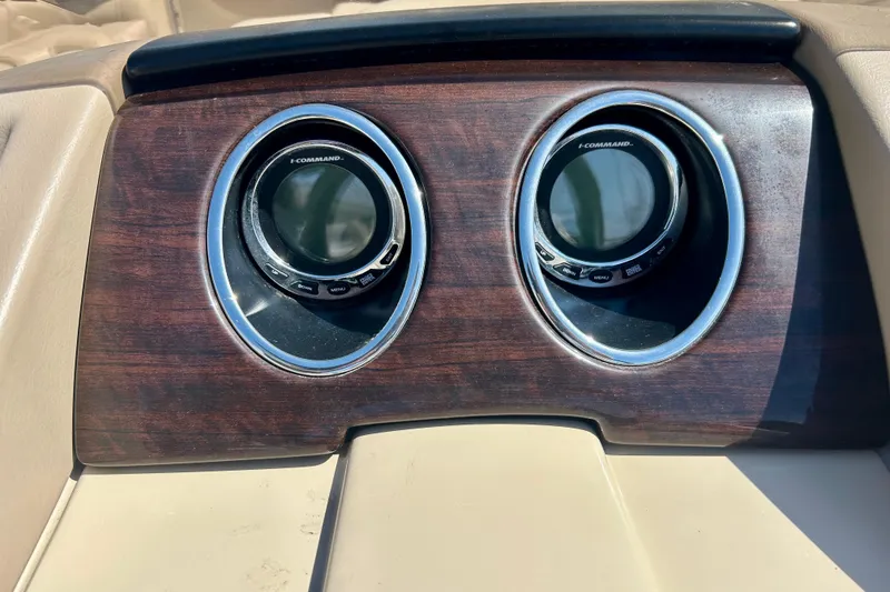 Slide: The Image of Dashboard of 2012 Bennington 2250RCL with dual I-Command gauges. - 19