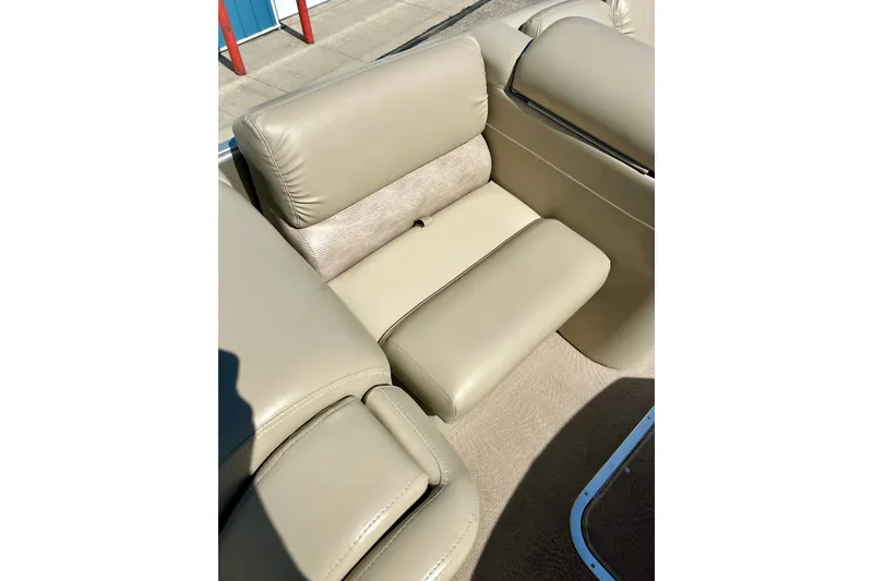Slide: The Image of Beige leather seating on a 2012 Bennington 2250RCL boat, showcasing comfort and style. - 28