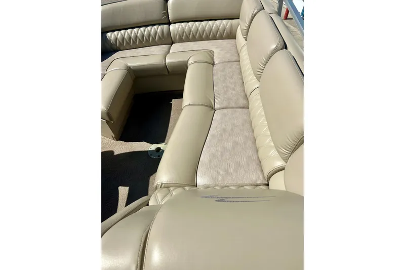 Slide: The Image of Luxurious beige seating on a 2012 Bennington 2250RCL boat, showcasing comfort and style. - 30