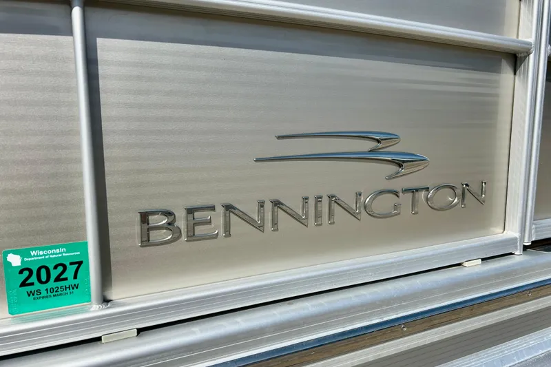 Slide: The Image of 2012 Bennington 2250RCL boat with Wisconsin registration sticker, silver exterior. - 45