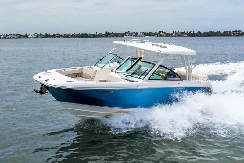 Slide: The Image of Manufacturer Provided Image: 2017 Boston Whaler 320 Vantage cruising on water with passengers. - 1