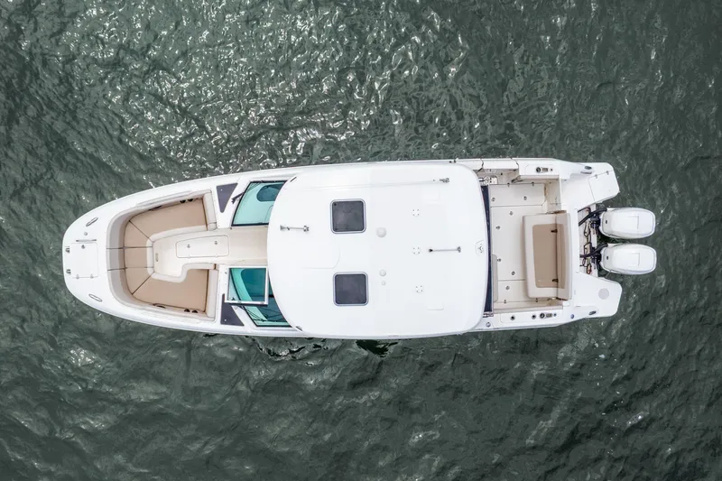 Slide: The Image of Overhead view of 2017 Boston Whaler 320 Vantage boat on water. - 16