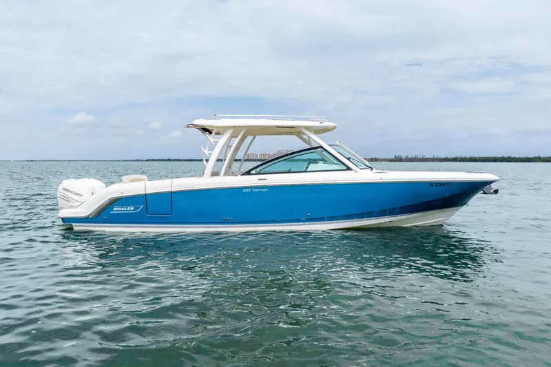 Slide: The Image of Manufacturer Provided Image: 2017 Boston Whaler 320 Vantage boat on water with people onboard. - 4