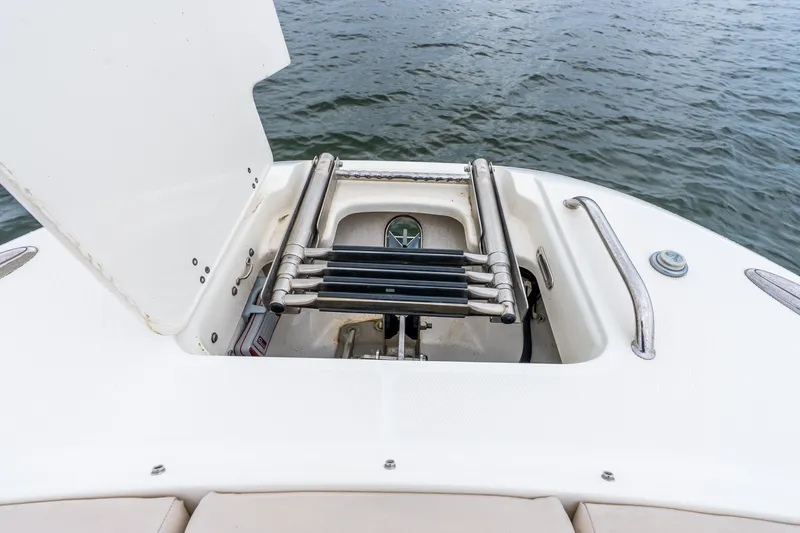 Slide: The Image of 2017 Boston Whaler 320 Vantage swim platform with ladder, open hatch, and ocean view. - 40