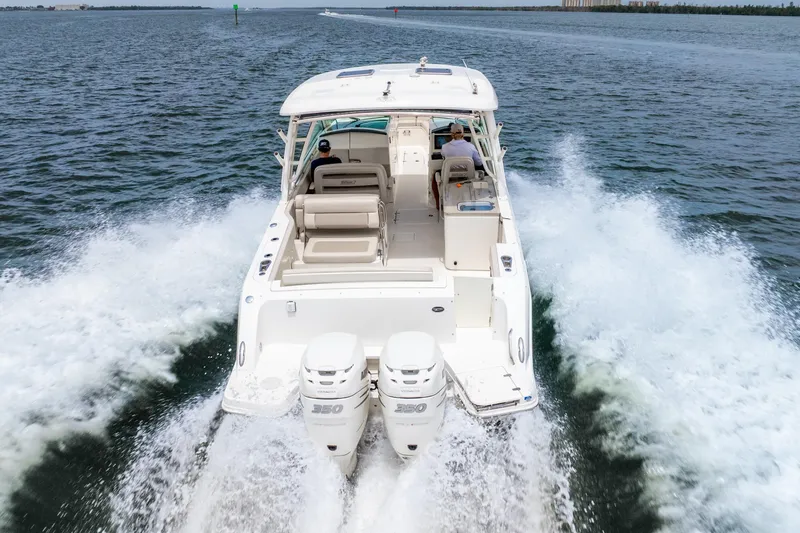 Slide: The Image of Manufacturer Provided Image: 2017 Boston Whaler 320 Vantage boat with dual 300 HP engines, people fishing. - 5