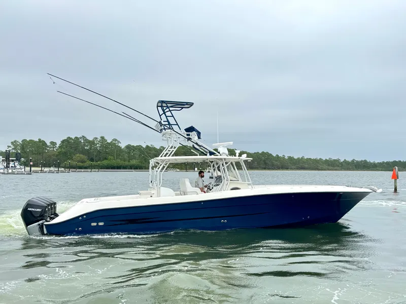 Slide: The Image of 2009 Hydra-Sports Vector 4100CC boat on calm water. - 11