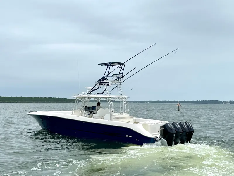 Slide: The Image of 2009 Hydra-Sports Vector 4100CC on water with four outboard engines. - 12