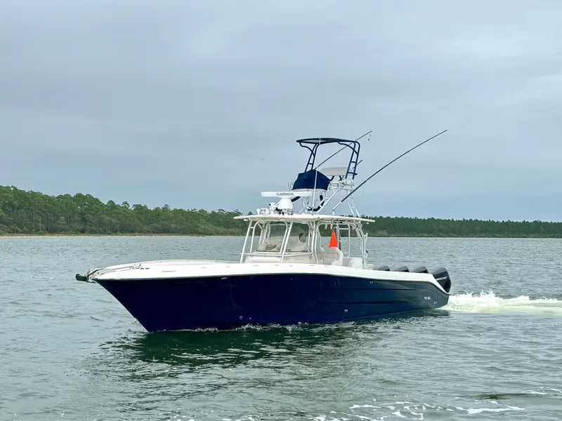 Slide: The Image of 2009 Hydra-Sports Vector 4100CC boat on calm water. - 15