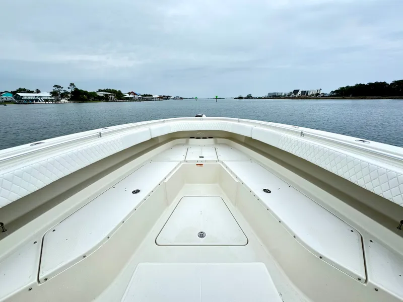 Slide: The Image of 2009 Hydra-Sports Vector 4100CC on calm waters with coastal view. - 17