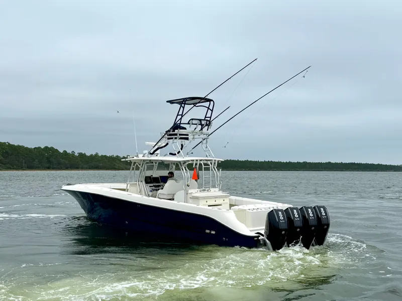 Slide: The Image of 2009 Hydra-Sports Vector 4100CC boat on calm water. - 2