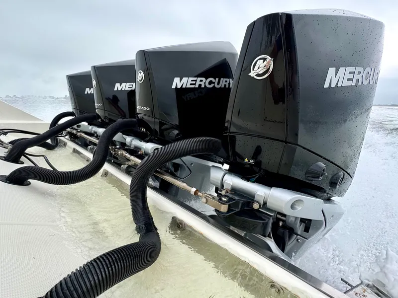 Slide: The Image of Four Mercury engines on a 2009 Hydra-Sports Vector 4100CC boat. - 22
