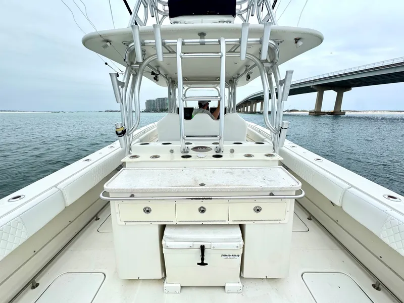 Slide: The Image of 2009 Hydra-Sports Vector 4100CC on calm waters under bridge. - 25