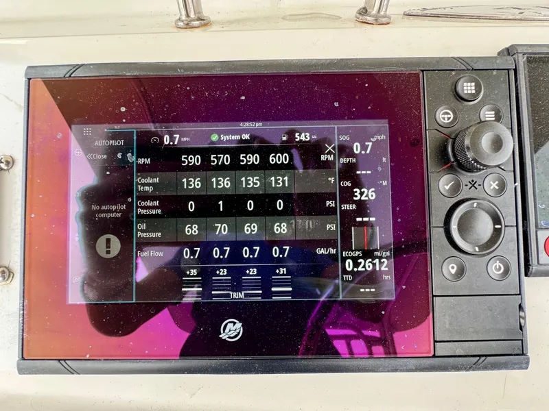 Slide: The Image of Hydra-Sports Vector 4100CC 2009 boat instrument display with performance data. - 44