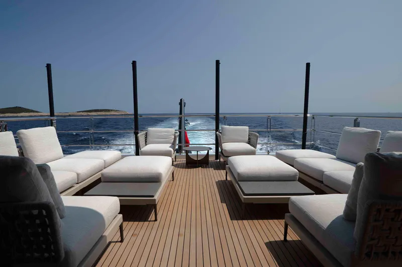 Slide: The Image of Luxurious deck of 2025 Alpha 100 Squalo Co Ownership yacht with ocean view. - 14