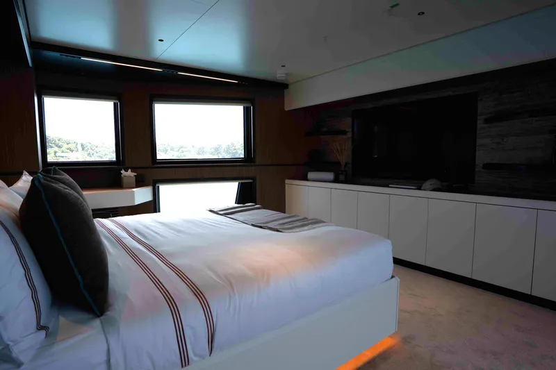Slide: The Image of Luxurious bedroom interior in 2025 Alpha 100 Squalo Co Ownership yacht, featuring modern design. - 28