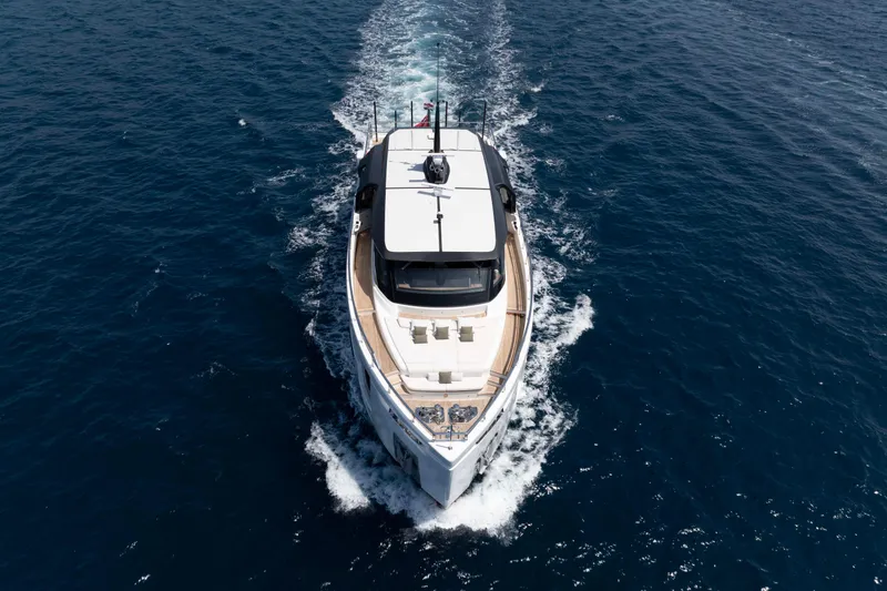 Slide: The Image of Aerial view of 2025 Alpha 100 Squalo Co Ownership yacht cruising on open sea. - 3