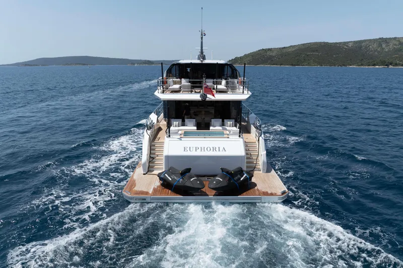 Slide: The Image of Luxury yacht "Euphoria" cruising, Alpha 100 Squalo Co Ownership, 2025 model, on open sea. - 5