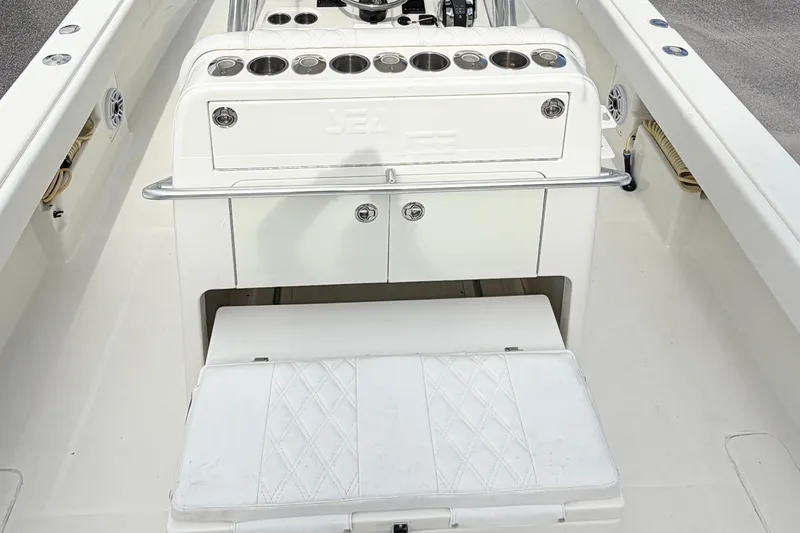 Slide: The Image of 2017 SeaVee 340Z boat interior with seating and storage compartments. - 11