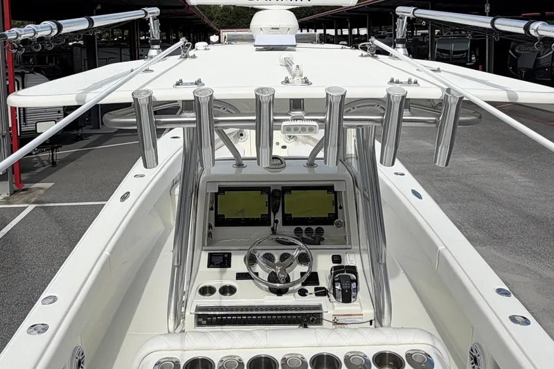 Slide: The Image of 2017 SeaVee 340Z boat cockpit with advanced navigation system and rod holders. - 12