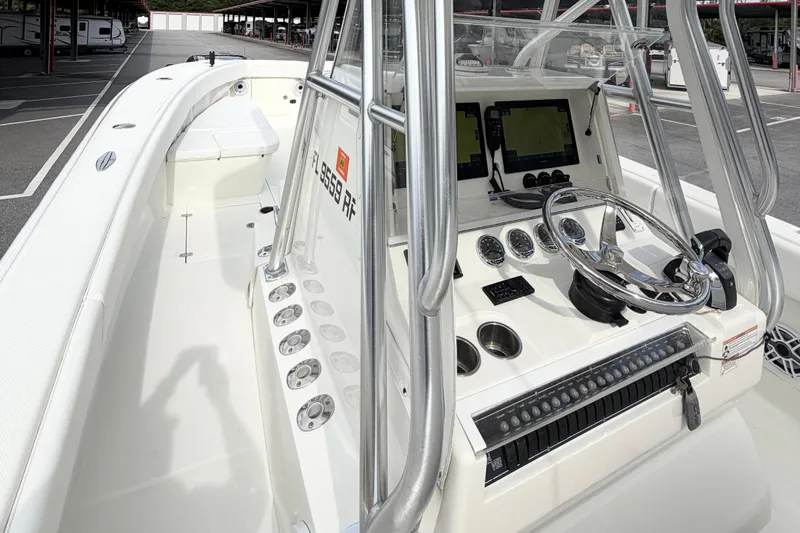 Slide: The Image of 2017 SeaVee 340Z boat interior with steering console and navigation equipment. - 6