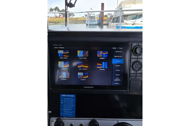 Slide: The Image of Garmin GPS display on 2021 KingFisher 2825 Coastal Express boat dashboard. - 11