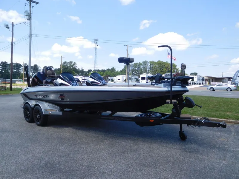 Slide: The Image of 2026 Vexus VXs21 boat parked on trailer outdoors. - 7