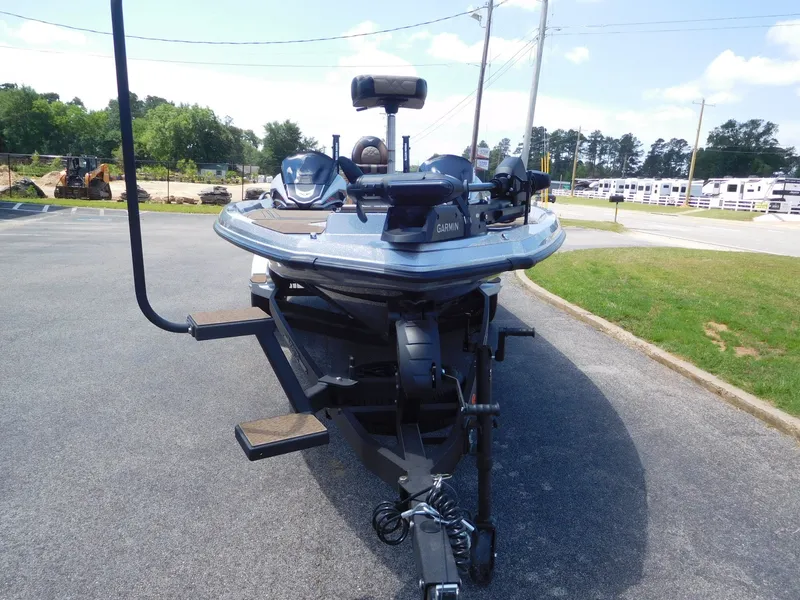 Slide: The Image of 2026 Vexus VXs21 boat on trailer, parking lot view. - 8