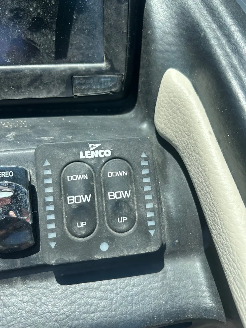 Slide: The Image of Lenco control panel on a 2019 Crownline E255XS boat. - 16